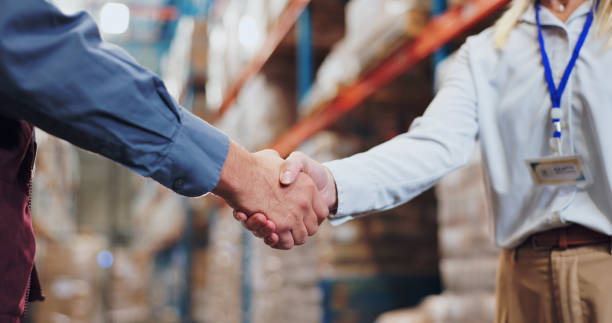 Business handshake recording the parties to a waste movement